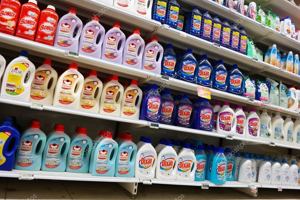 WALLONIA, BELGIUM - OCTOBER 2014: Bottles liquid laundry detergent on display in a Carrefour Hypermarket in Belgium