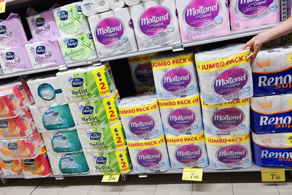 MALMEDY, BELGIUM - MAY 2015: Aisle with a variety of toilet paper in bulk packing in a Carrefour Hypermarket