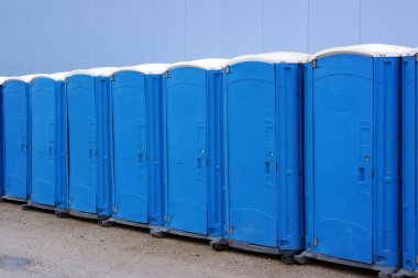 A line of portable toilets
