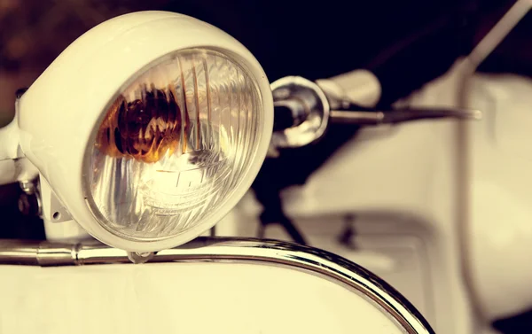 Old headlight of scooter — Stock Photo, Image
