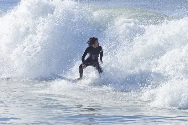 Athlete surfing on Santa Cruz beach in California — Stock Photo, Image