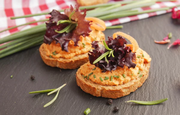 Salmon pate on toast rye bread — Stock Photo, Image