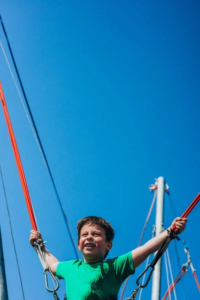 Cute Joyful Smiling Boy Playing Big Bungee Trampoline — Stock Photo, Image