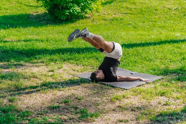 Young Sporty Handsome Man Practicing Yoga Park Doing Plow Pose — Stock Photo, Image