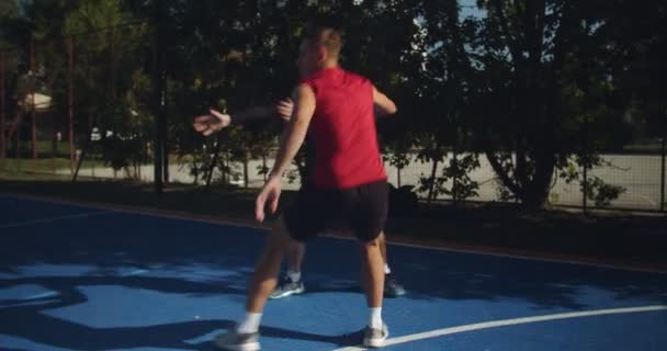 Friends Playing Basketball Court Camera Player — Stock Video