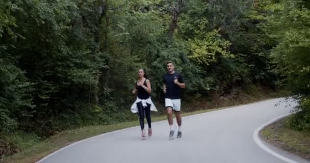 Coppia Atletica Che Corre Una Strada Natura Forma Concetto Sano — Video Stock