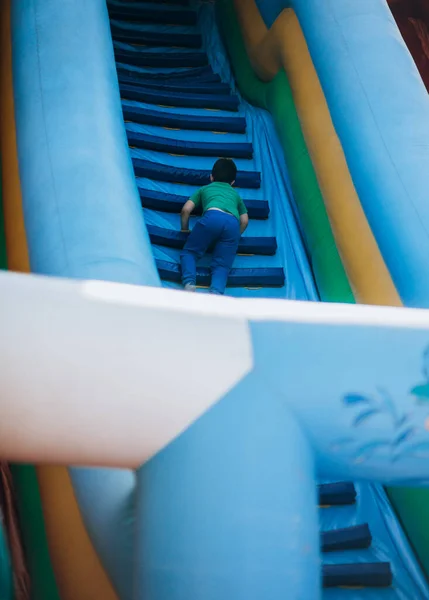 Cute Joyful Smiling Boy Going Slide Big Inflatable Slide — Stock Photo, Image