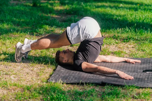 Young Sporty Handsome Man Practicing Yoga Park Doing Plow Pose — Stock Photo, Image