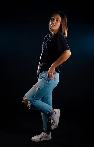 Stylish Young Woman Wearing Blue Denim Pants Sporty Tank Top — Stock Photo, Image