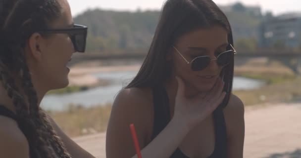 Young Female Friends Sitting Together Bench Park — Stock Video