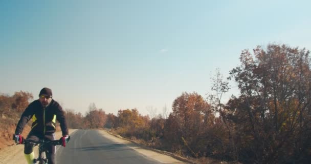 Senior Male Riding His Bicycle Open Road — Stock Video