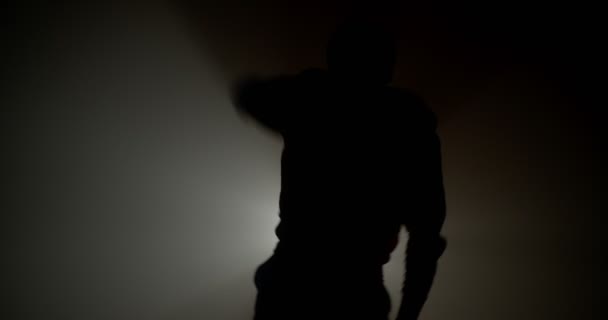 Silhouette Boy Studio Fog Light Rays Dancing — Stock Video
