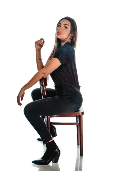 Stylish Young Woman Wearing Black Clothing While Sitting Cheir Modern — Stock Photo, Image