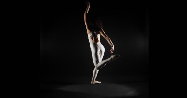 Ballerina Doing Hands Spiral Moves While Kicking Her Legs Air — Stock Video