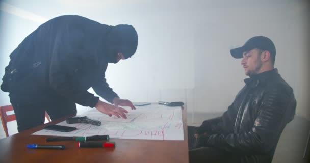 Criminals Wearing Camouflage Hood Planning Robbery Garage — Stock Video