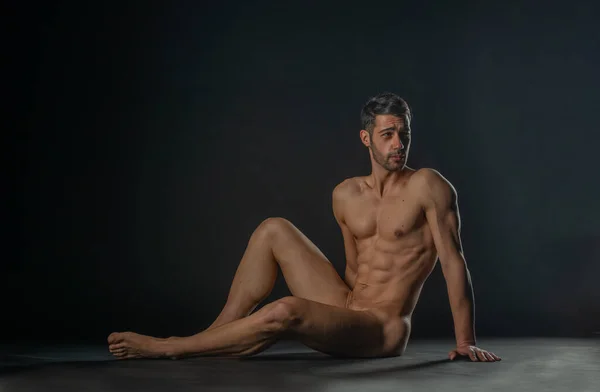 Fashion Nude Photo Male Model Seductive Figure Sitting Isolated Floor — Stock Photo, Image