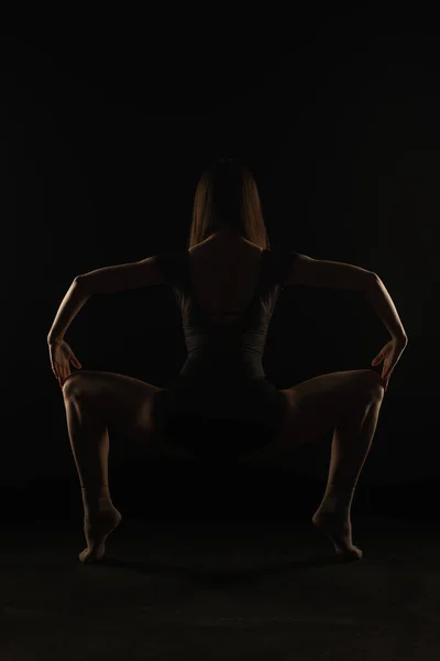Ballerina Holding Nice Squat Posture Back Silhouette Royalty Free Stock Photos