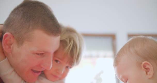 Handsome Father Playing His Two Kids While Making Them Laugh — Stock Video