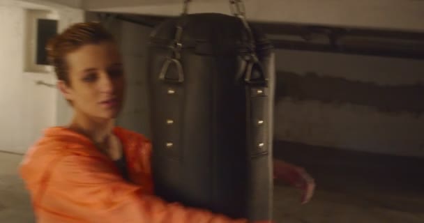 One Girl Hugging Punching Bag Middle Training — Stock Video