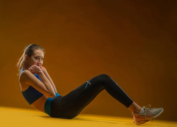 Fit Woman Stretching Warming Isolated Yellow Background — Stok Foto