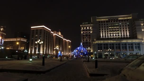 MOSCOW, RUSSIA - JAN 15, 2016: Huge Christmas decoration made of lights was placed on Manezh square in front of Kremlin. Height is 11 m decorations. — Stock Video