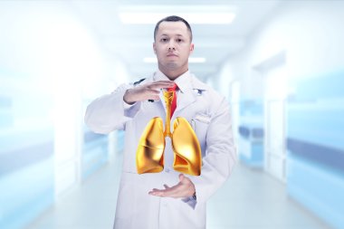 Elinde stetoskop ve altın akciğerler ilerler. Yüksek çözünürlük.