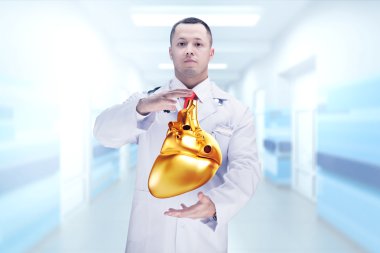 Elinde stetoskop ve altın kalp li doktor. Yüksek çözünürlük.