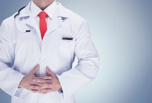 Doctor with stethoscope in a hospital. High resolution. — Stock Photo, Image