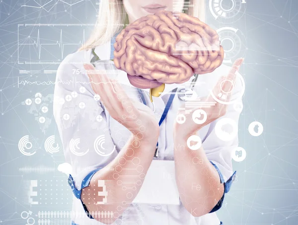 Doppelbelichtung, Arzt mit Stethoskop und Gehirn an den Händen. grauer Hintergrund. — Stockfoto