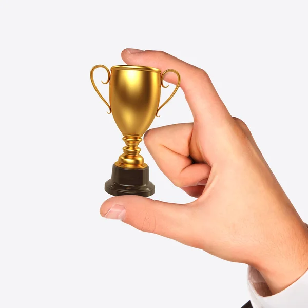 Winner cup in hand. — Stock Photo, Image