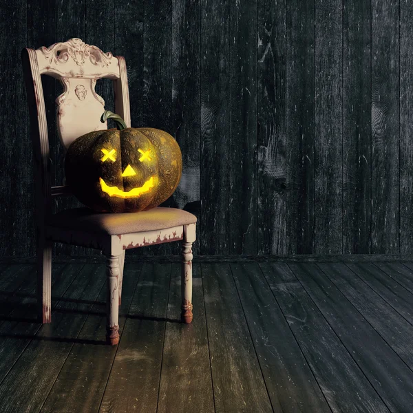 Halloween Jack-O-Lantern Citrouille sur une chaise . — Photo