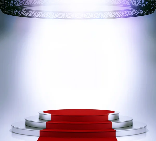 Illuminated empty stage podium with red carpet for award ceremony — Stock Photo, Image