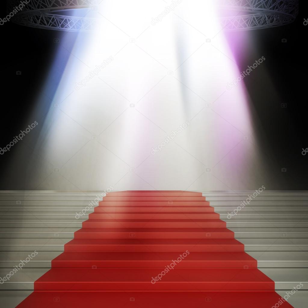 Illuminated empty stage podium with red carpet for award ceremony