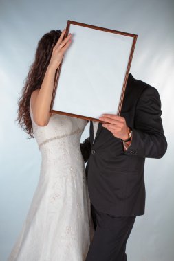 Gelin ve damat ile bir kare fotoğraf için