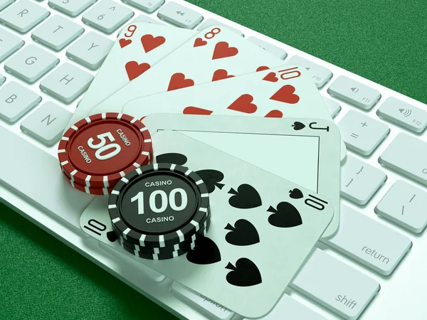 Cartões e fichas para poker no teclado . — Fotografia de Stock