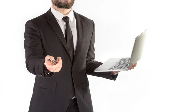 Hipster man i klassisk kostym isolerad på en vit bakgrund med en notebookt i handen. — Stockfoto