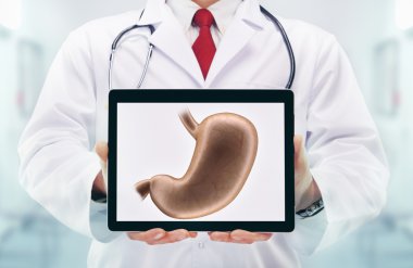 Doktor stetoskop bir hastanede ile. Mide Tablet