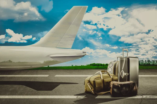 Travel bags in airport and airliner. Concept — Stockfoto