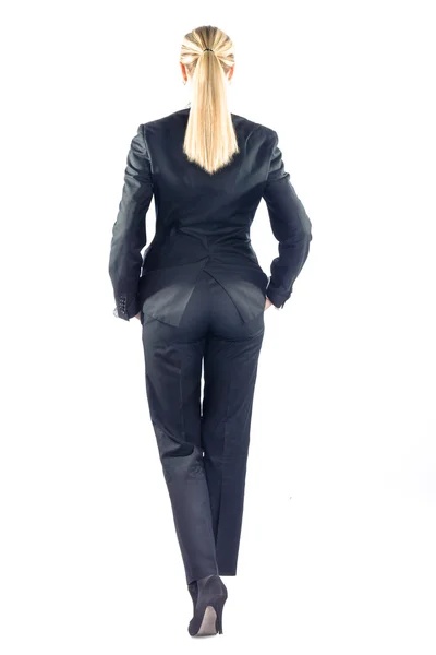 Geschäftsfrau steht mit dem Rücken zur Kamera, Isolation auf weiß — Stockfoto