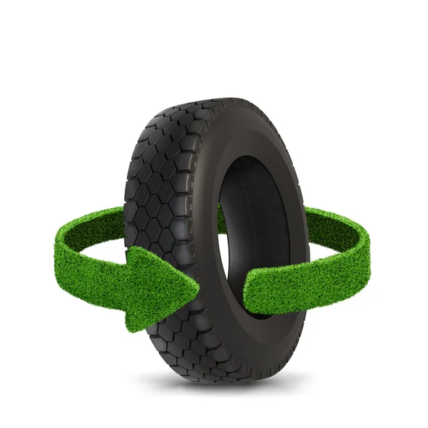 Car tyre. Concept with green arrows from the grass. Recycling concept — Stock Photo, Image