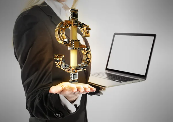 Young businesswoman with laptop and dollar money sign in hand