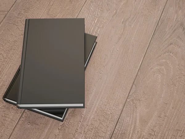 Mockup van het boek met een zwarte cover op een houten achtergrond — Stockfoto