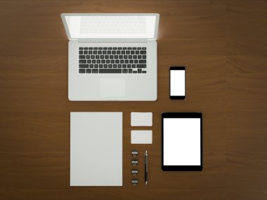 Mockup iş şablonu. Braun ahşap masa üzerinde öğeleri kümesi.