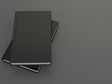 Mockup gri bir arka plan üzerinde siyah kapaklı kitap
