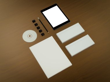 Mockup iş şablonu. Braun ahşap masa üzerinde öğeleri kümesi.