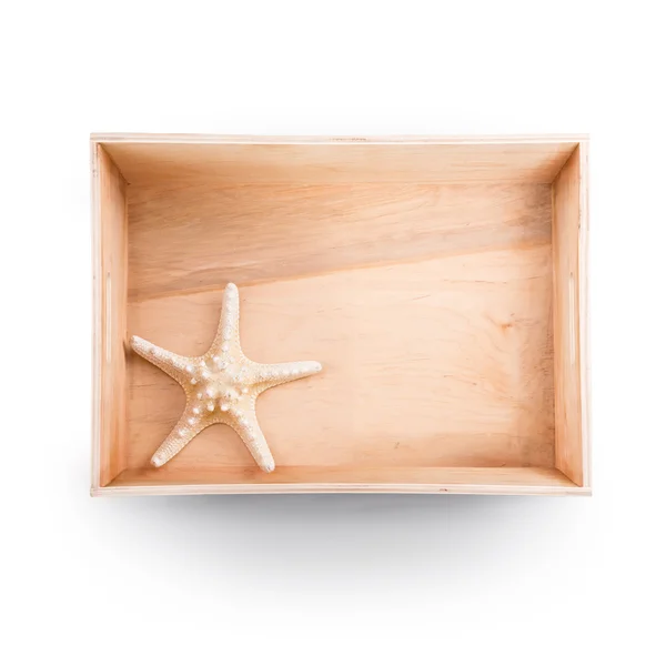 Widok z góry o drewniane pudełko. Rozgwiazda wewnątrz — Zdjęcie stockowe