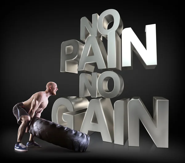 Athletic young man lifting a tire on the black background Motivational fitness phrases