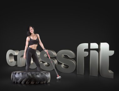 Bir çekiç üzerinde arka plan motivasyonel fitness ifadeler tutan spor kadın