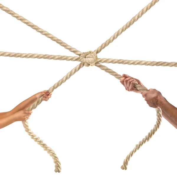 Руки людей тягнуть мотузку на білому тлі. Концепція конкуренції — стокове фото