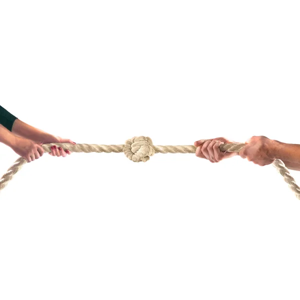Hände von Menschen, die das Seil auf weißem Hintergrund ziehen. Wettbewerbskonzept — Stockfoto